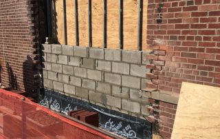 brick building being repaired